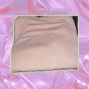 Pink Nike sweatshirt